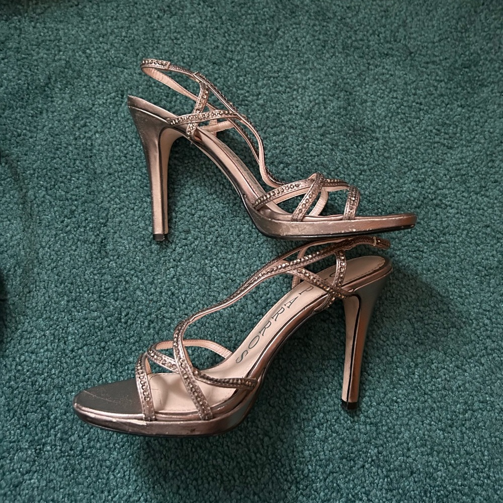 Silver Caparros jeweled pumps
